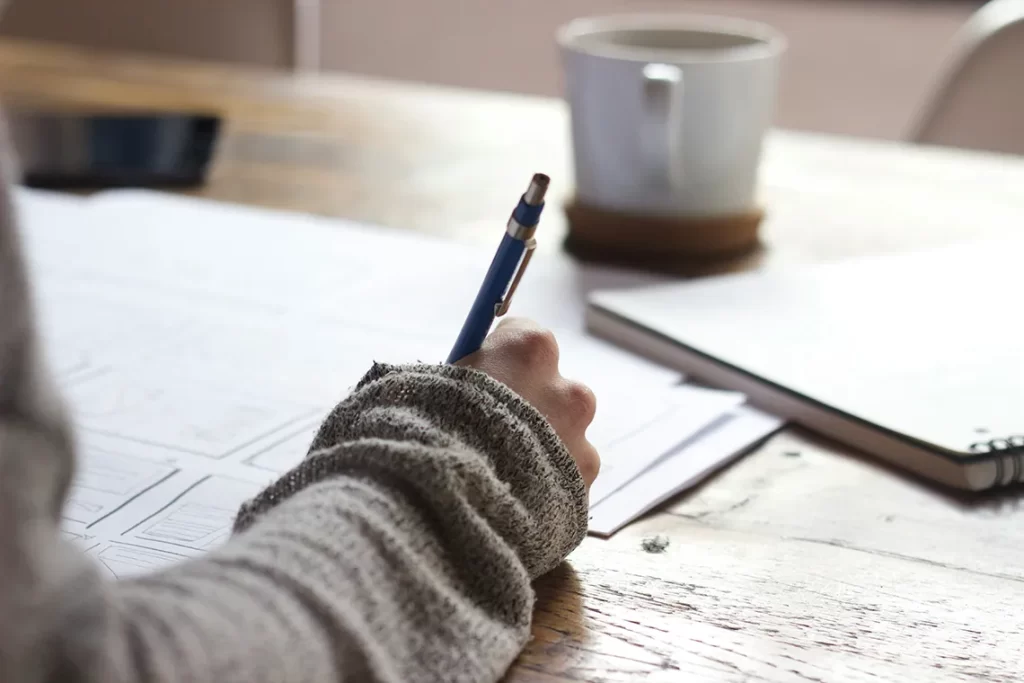 writing at desk